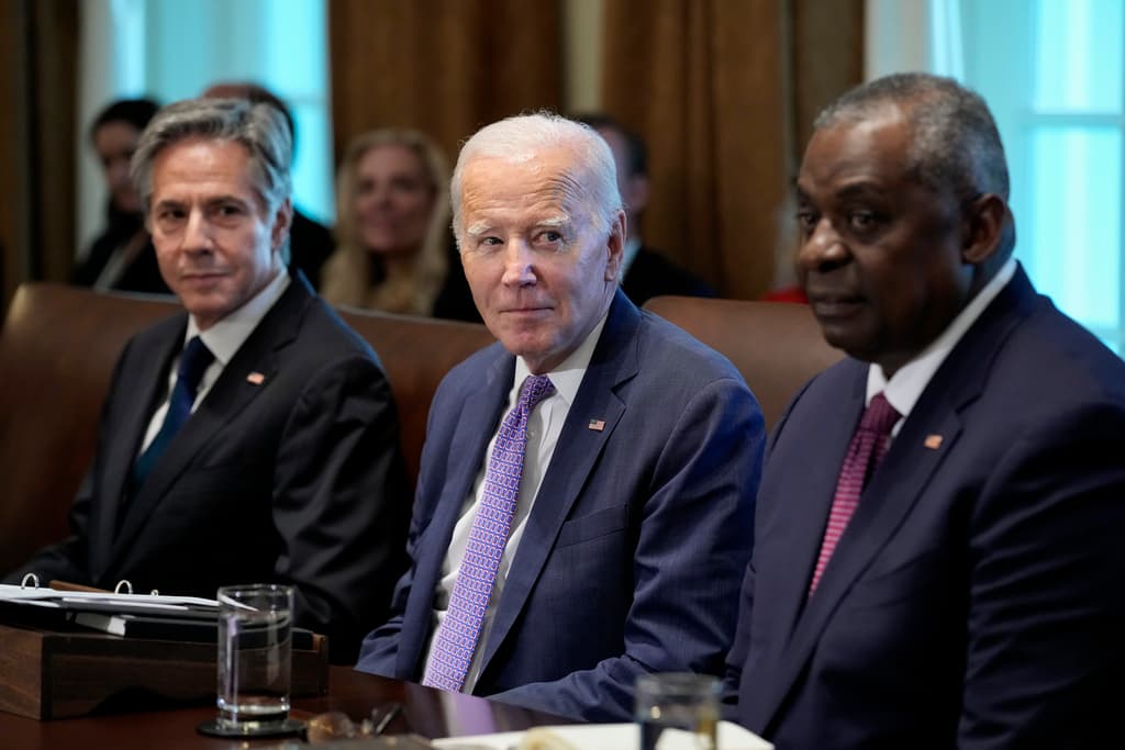 AP/Susan Walsh Secretary Blinken, left, President Biden, and Secretary Austin, right, at the White House, October 2, 2023.