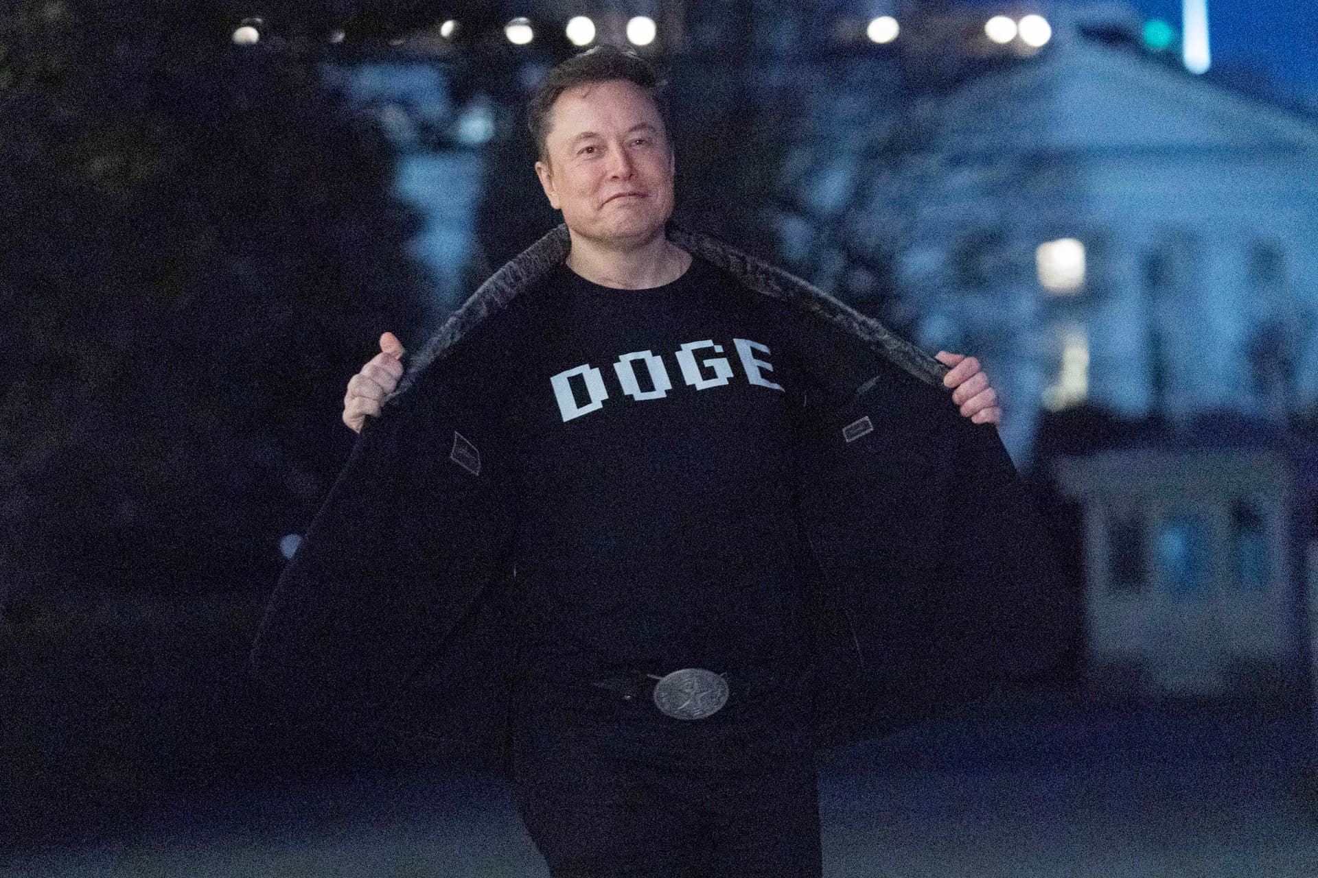 AP/Jose Luis Magana Elon Musk sports a T-shirt that reads 'DOGE' on the South Lawn of the White House, March 9, 2025.