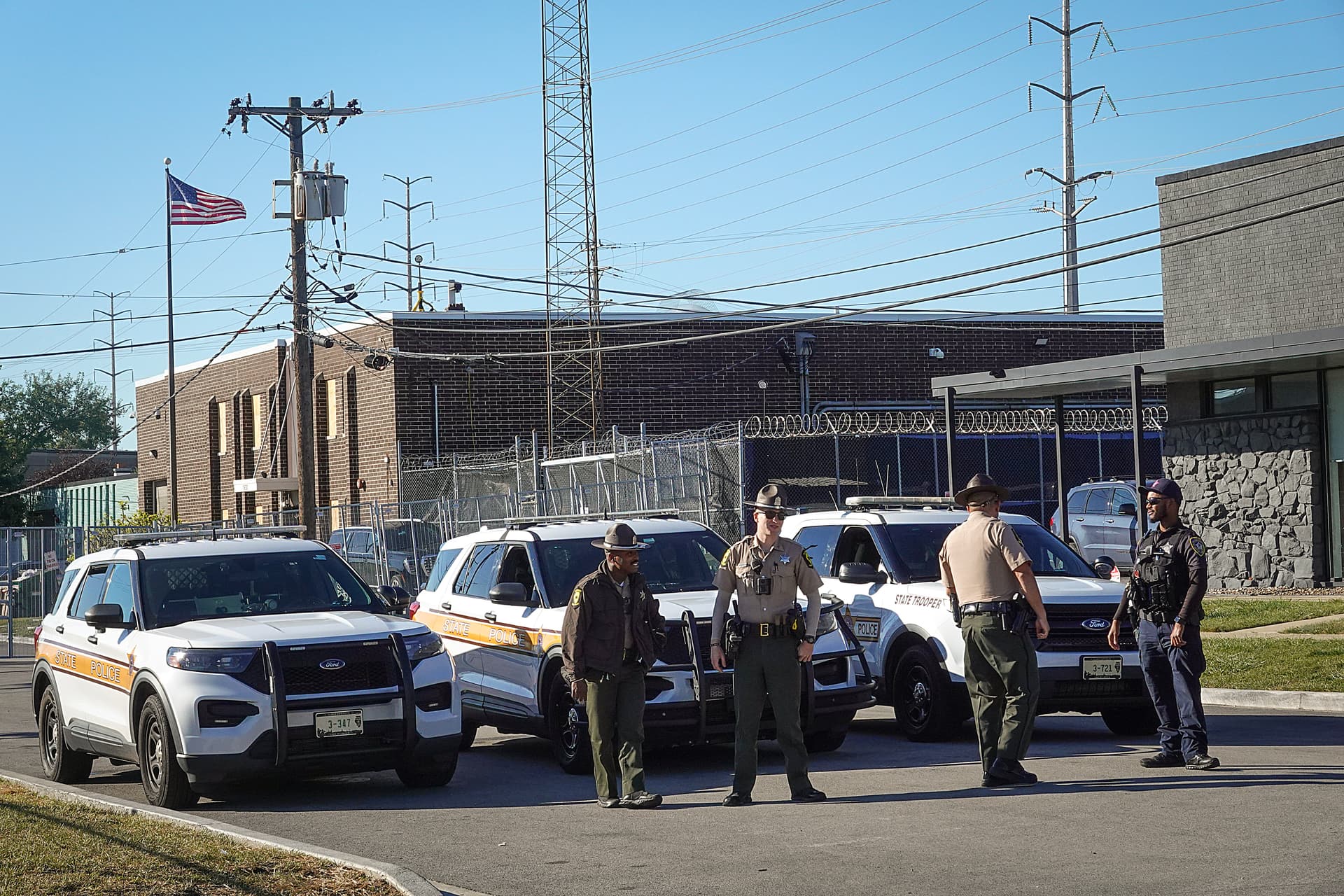 Scott Olson/Getty Images Illinois State Police stand guard at an immigration processing and detention facility on October 9, 2025, at Broadview.