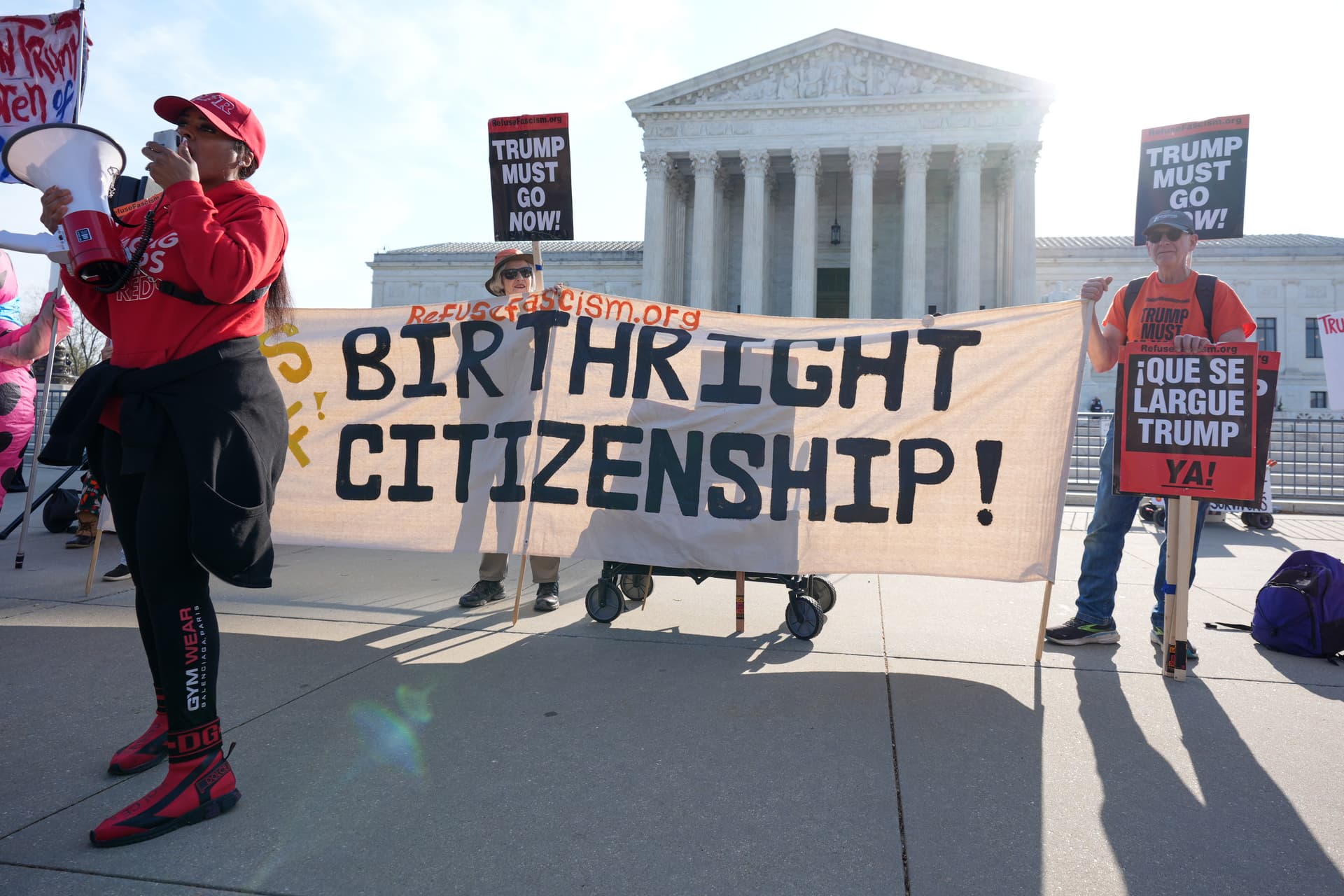 AP/J. Scott Applewhite Demonstrators outside the Supreme Court on the morning of arguments in the birthright citizenship case, April 1, 2026.