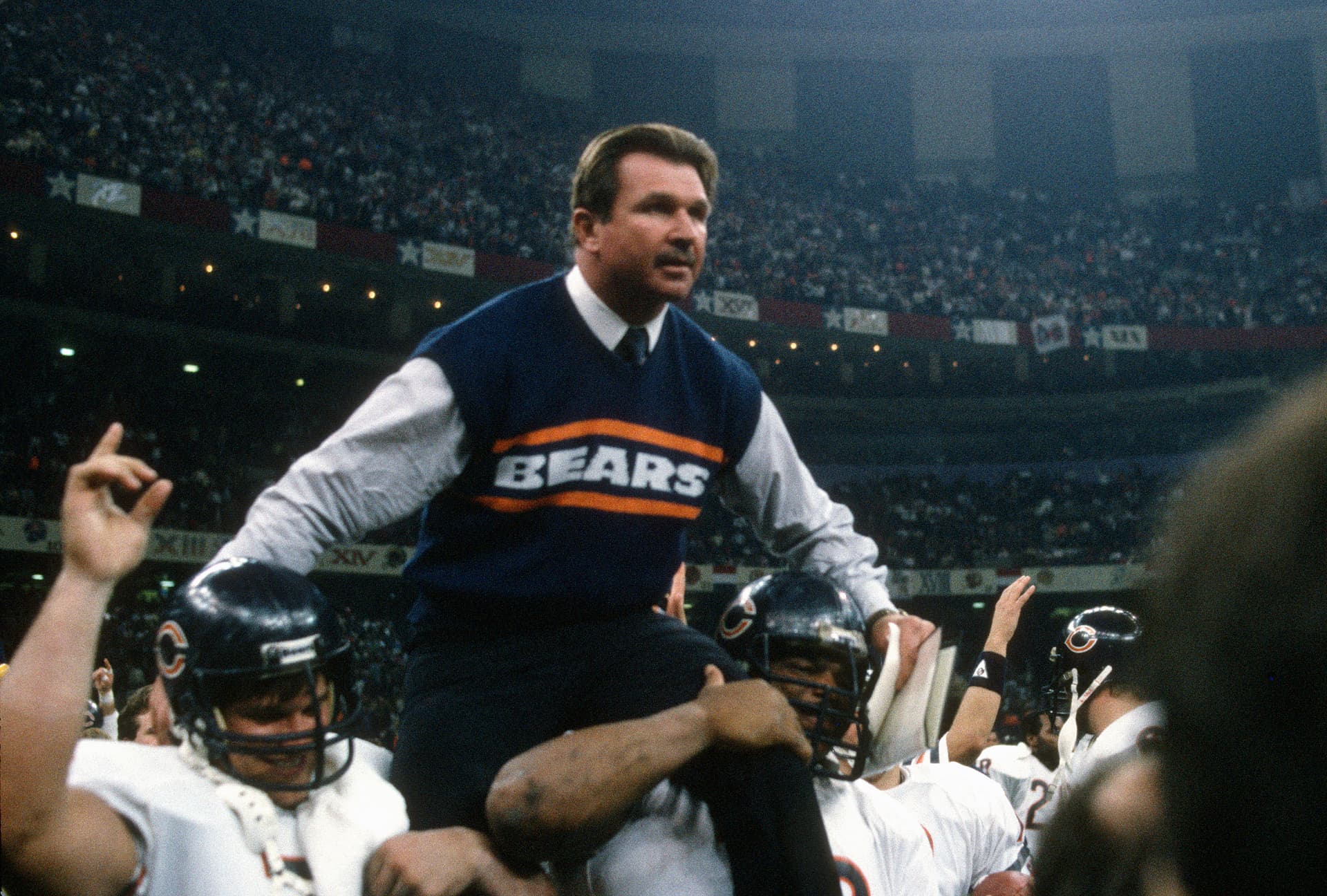 Focus on Sport/Getty Images Head Coach Mike Ditka gets carried off the field after his Chicago Bears defeated the New England Patriots in Super Bowl XX at New Orleans, Louisiana, on January 26, 1986.