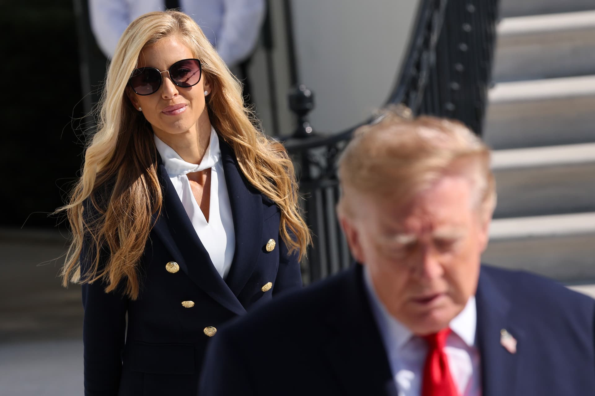 Win McNamee/Getty Images. Katie Zacharia joins President Donald Trump as he departs on the South Lawn of the White House.