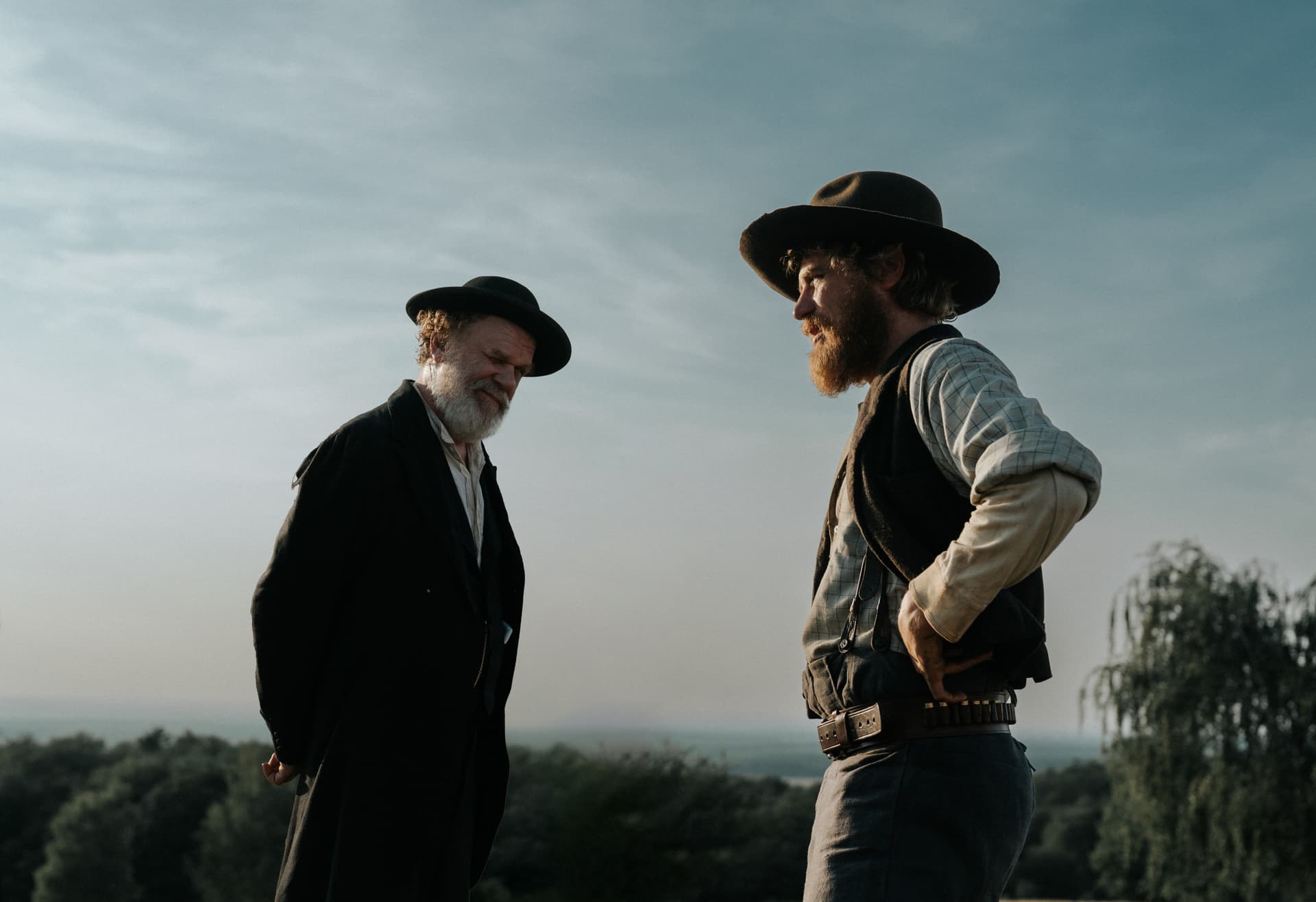 Quiver John C. Reilly and Johnny Flynn in 'A Prayer for the Dying.'