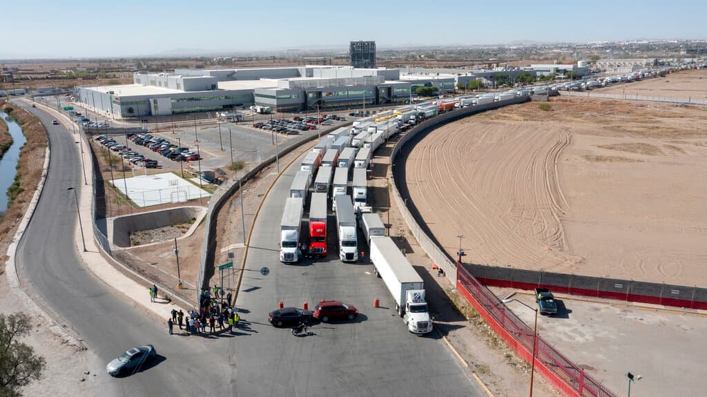 Trucks line up at the Zaragoza International Bridge, one of two ports of entry in Ciudad Juarez going into the U.S., April 12, 2022. Omar Ornelas/the El Paso Times via AP