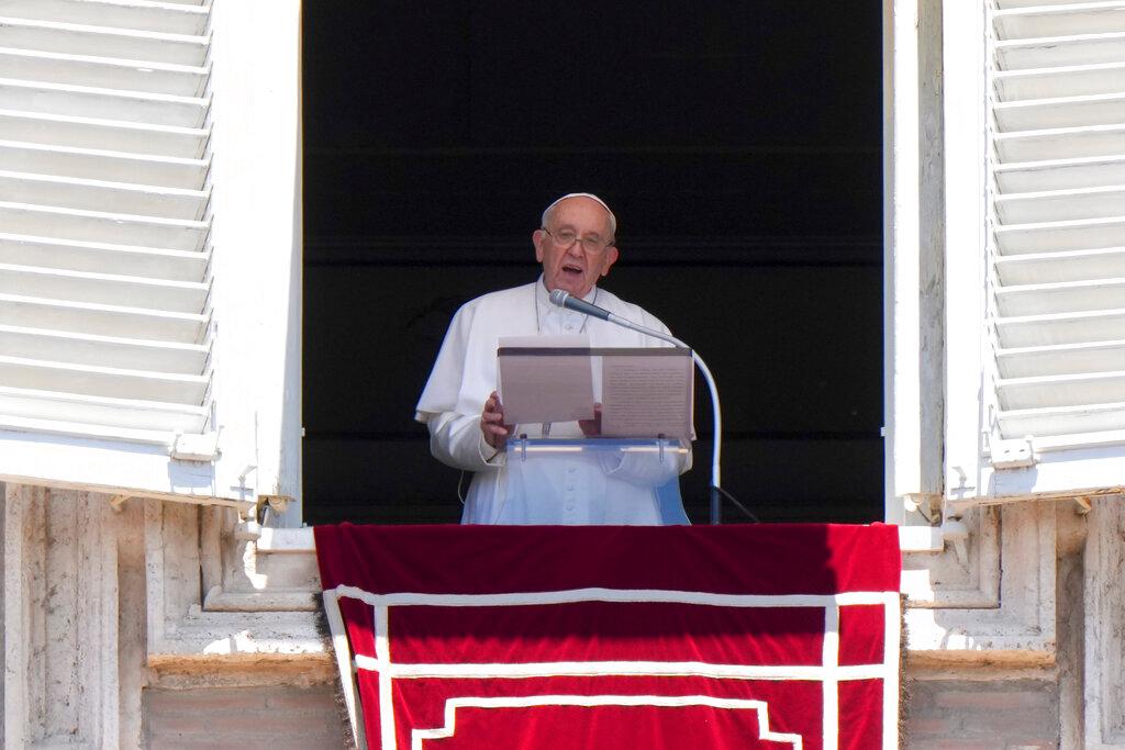 Pope Francis delivers his speech as he recites the Regina Coeli noon prayer from the window of his studio overlooking St. Peter's Square, at the Vatican, Sunday, June 12, 2022. (AP Photo/Andrew Medichini)