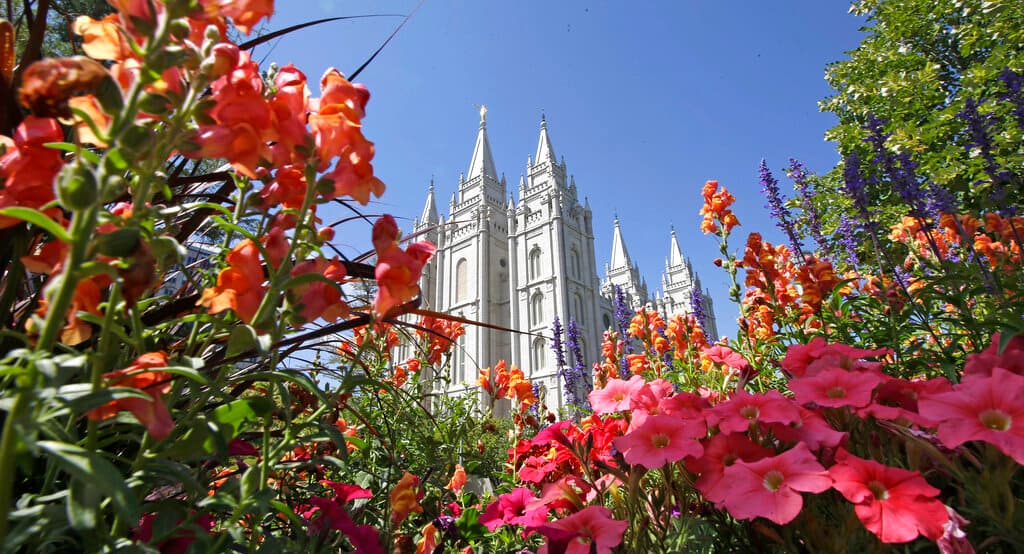 AP/Rick Bowmer, file Flowers bloom in front of the Mormon Salt Lake Temple, at Salt Lake City.