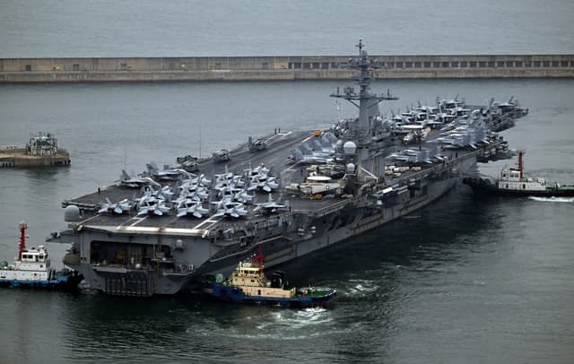 American Aircraft Carrier Steams Into South Korea's Busan Harbor in ...