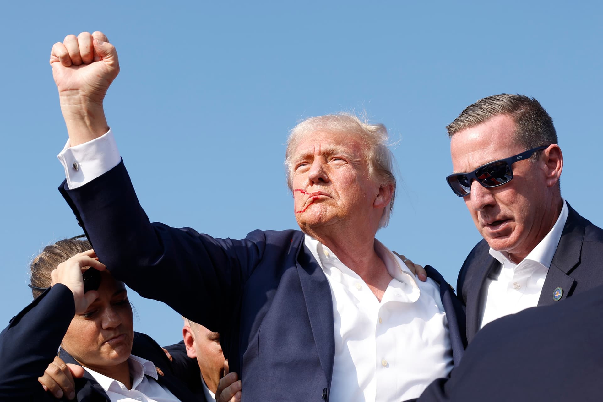 Anna Moneymaker/Getty Images President Trump is rushed offstage during an attempt on his life at a rally on July 13, 2024 at Butler, Pennsylvania.
