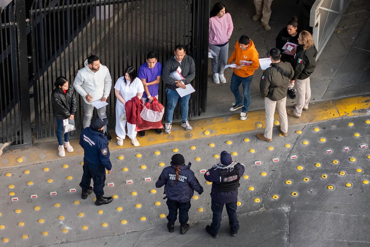 In this aerial view, Mexican immigration officials and police receive deportees after they were sent back into Mexico January 22, 2025 as seen from Nogales, Arizona. 