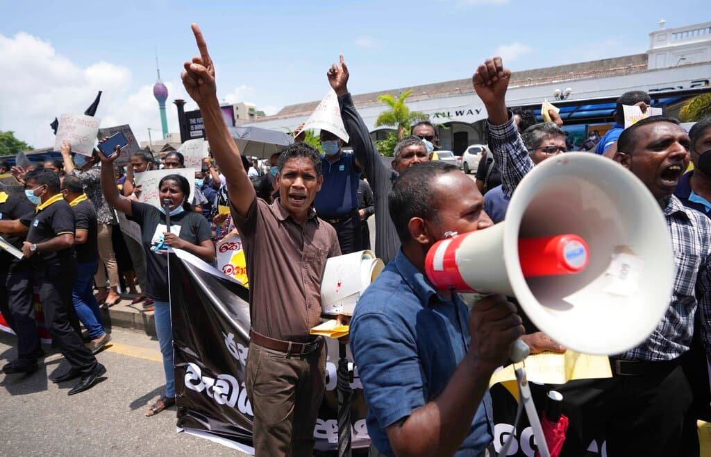 Sri Lankans during a protest at Colombo April 20, 2022. AP/Eranga Jayawardena