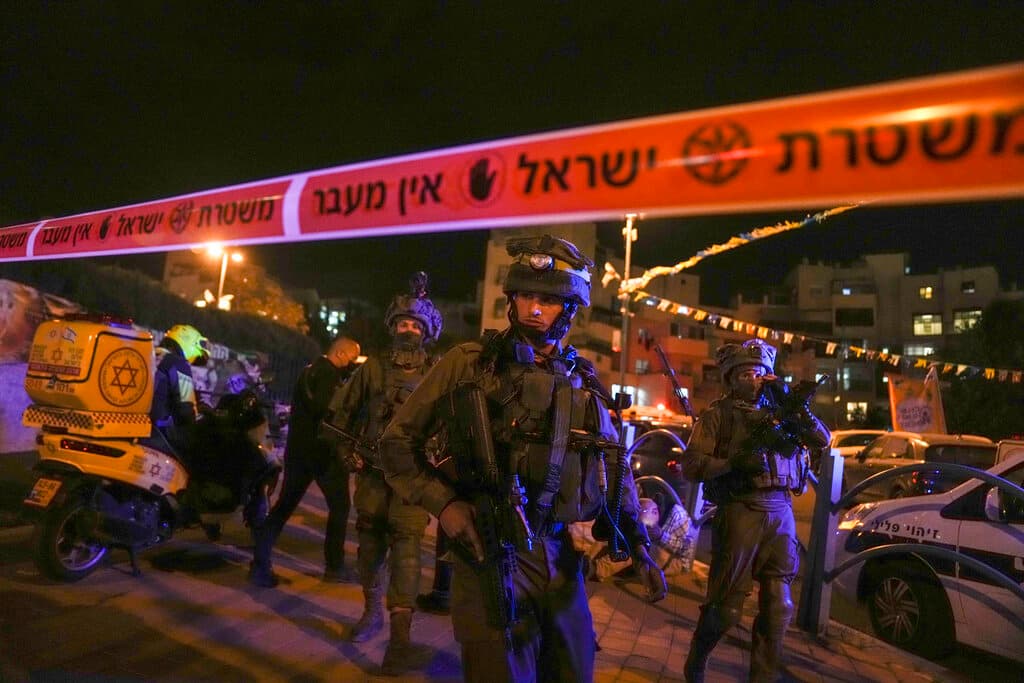Israeli forces secure the area of a stabbing attack in the town of Elad, Israel, May 5, 2022. AP/Maya Alleruzzo