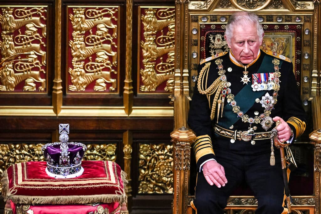 Ben Stansall/Pool Photo via AP Prince Charles sits by the crown at the House of Lords Chamber, Tuesday, May 10, 2022.