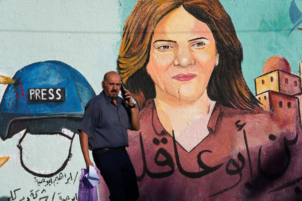 AP/Adel Hana A mural of slain of Al Jazeera journalist Shireen Abu Akleh at Gaza City May 15, 2022.
