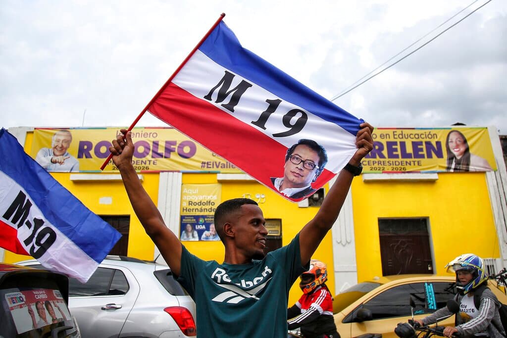 AP/Andres Quintero A supporter celebrates after a former leftist rebel, Gustavo Petro, won a runoff presidential election in Colombia, June 19, 2022.