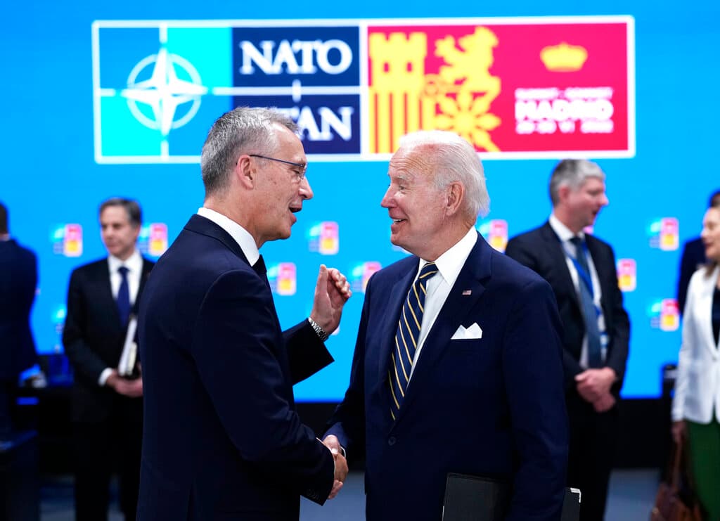 AP/Bernat Armangue NATO's secretary-general, Jens Stoltenberg, with President Biden at a NATO summit at Madrid, June 30, 2022.