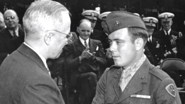 U.S. Marine Corps via Wikimedia Commons. President Truman congratulates Hershel 'Woody' Williams on being awarded the Medal of Honor, October 5, 1945 at the White House.