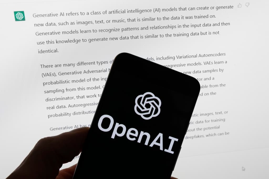 AP/Michael Dwyer, file The OpenAI logo is seen on a mobile phone in front of a computer screen displaying output from ChatGPT.