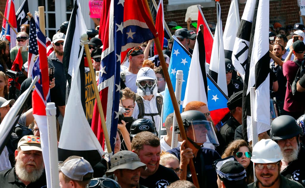 AP/Steve Helber Demonstrators and counter demonstrators on August 12, 2017, at Charlottesville, Virginia.