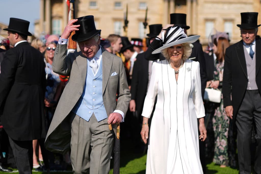 Jordan Pettitt/Pool via AP Britain's King Charles III and Queen Camilla attend a Royal Garden Party at Buckingham Palace, London, on May 8, 2024.