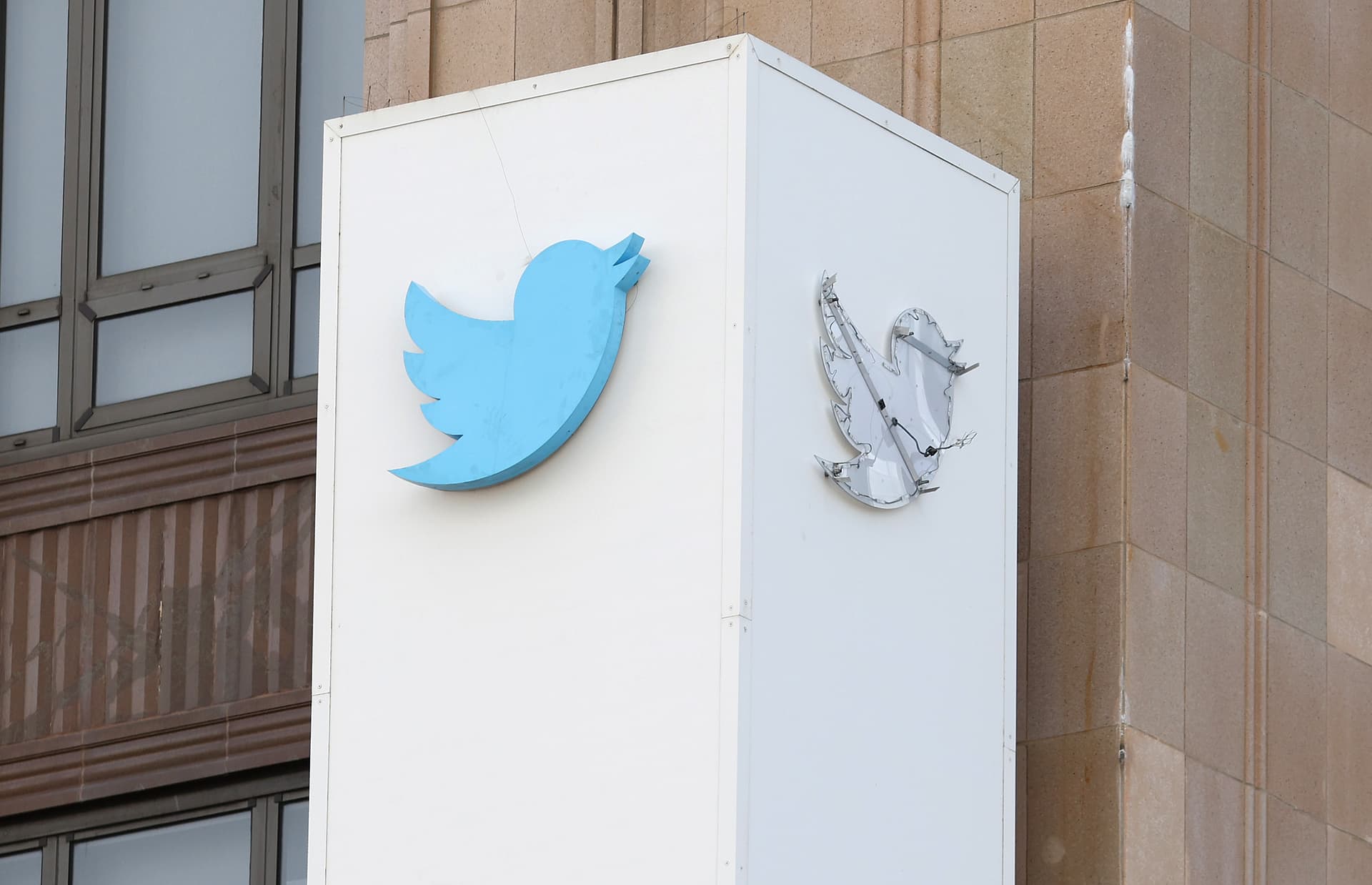 Getty Images The outline of the iconic blue Twitter bird logo is visible on a sign in front of X headquarters in San Francisco, California.