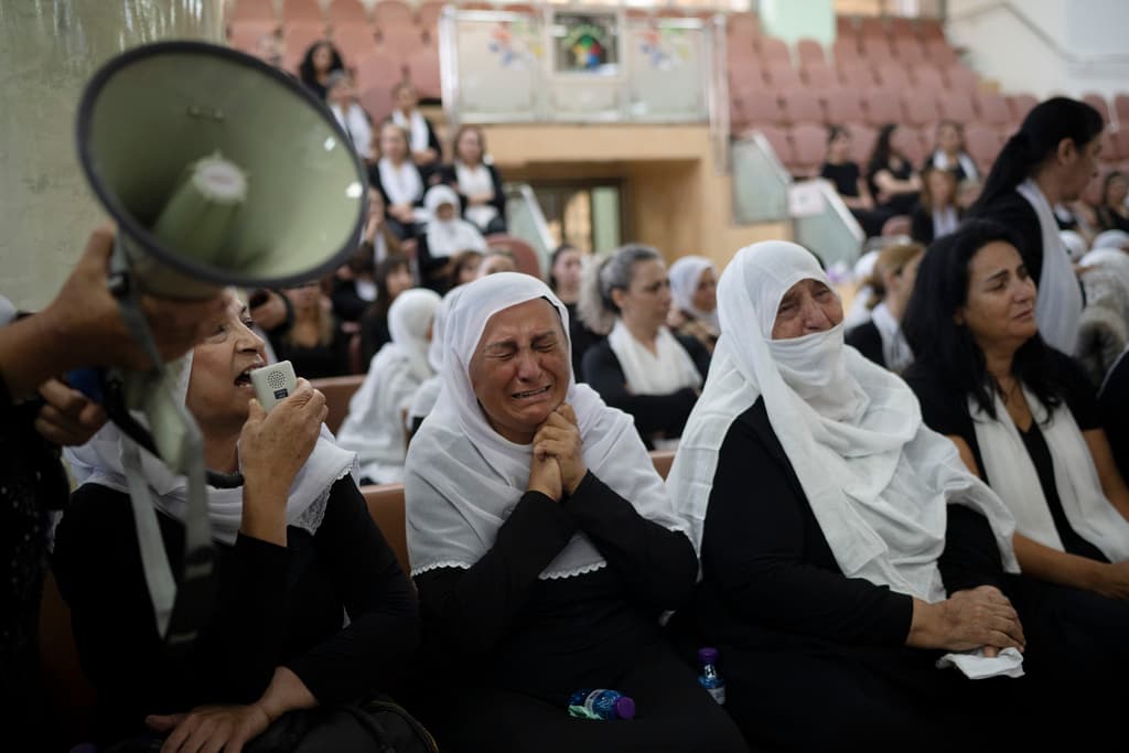 AP/Leo Correa Members of the Druze minority attend a memorial ceremony July 29, 2024, for the children and teenagers killed in a rocket strike at a soccer field over the weekend at the village of Majdal Shams, Golan Heights.