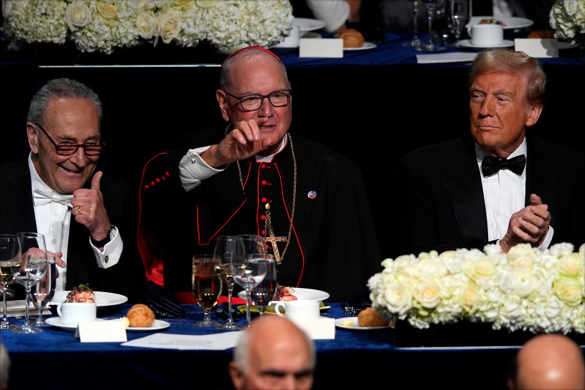 AP/Julia Demaree Nikhinson Senator Schumer, left, Timothy Cardinal Dolan, center, and President Trump at the Al Smith Memorial Foundation Dinner, October 17, 2024, at New York.