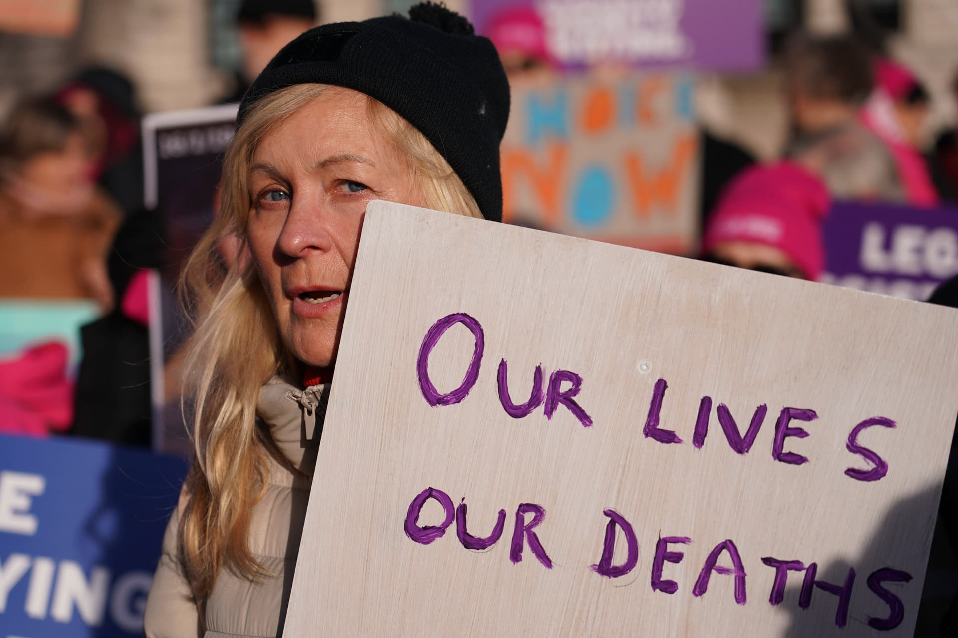 AP/Alberto Pezzali Pro-legal assisted suicide supporters demonstrate.
