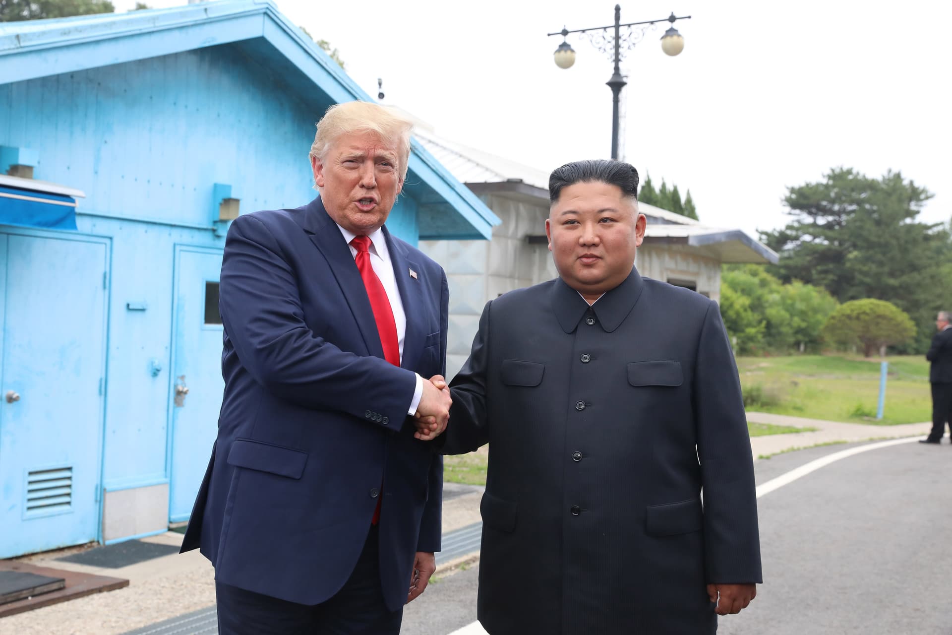 Handout photo by Dong-A Ilbo via Getty Images, file President Trump and the North Korean leader, Kim Jong-un, inside the demilitarized zone on June 30, 2019, at Panmunjom, South Korea.