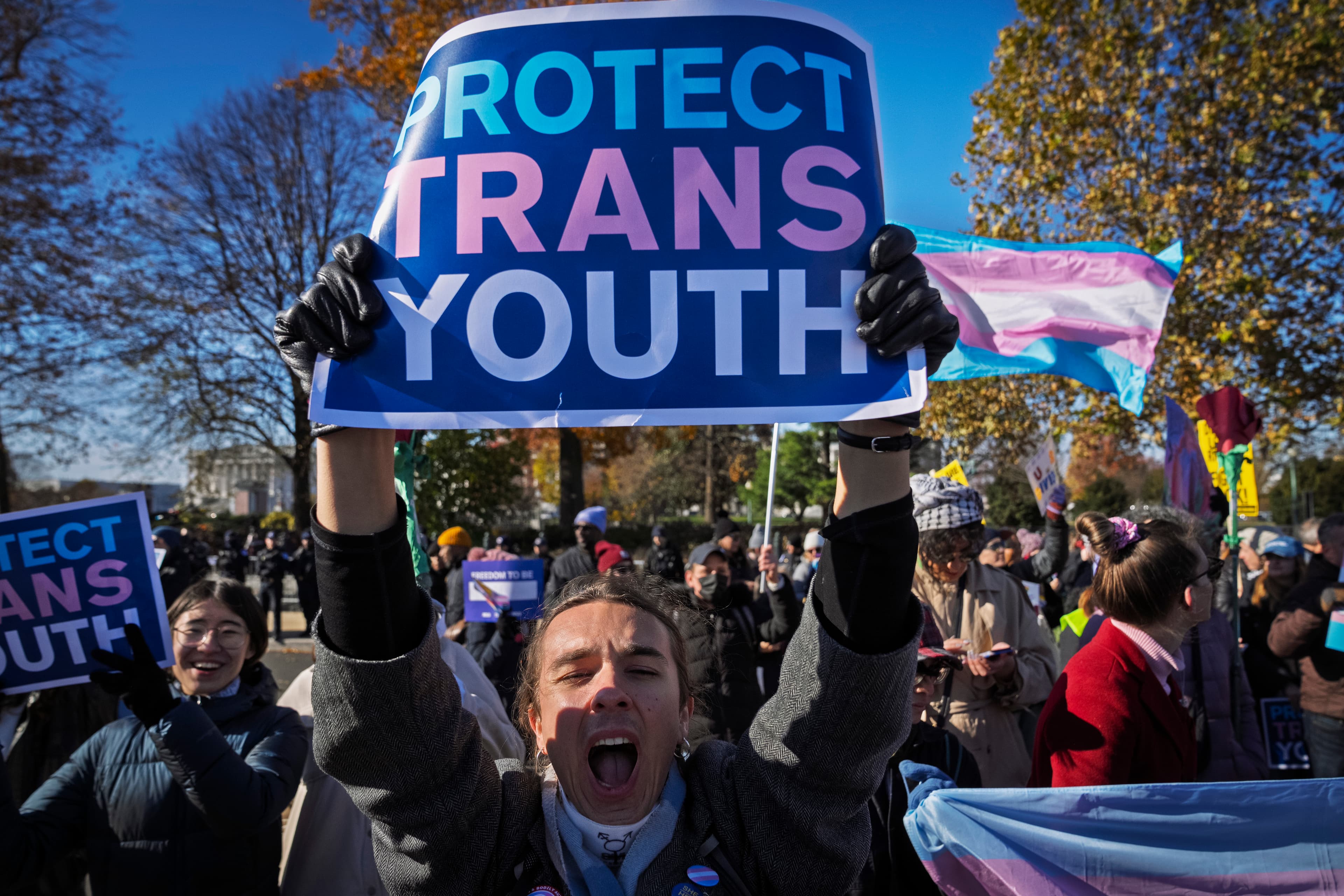 A young person cheers as supporters of transgender rights rally by the Supreme Court, December 4, 2024. A young person cheers as supporters of transgender rights rally by the Supreme Court, December 4, 2024.