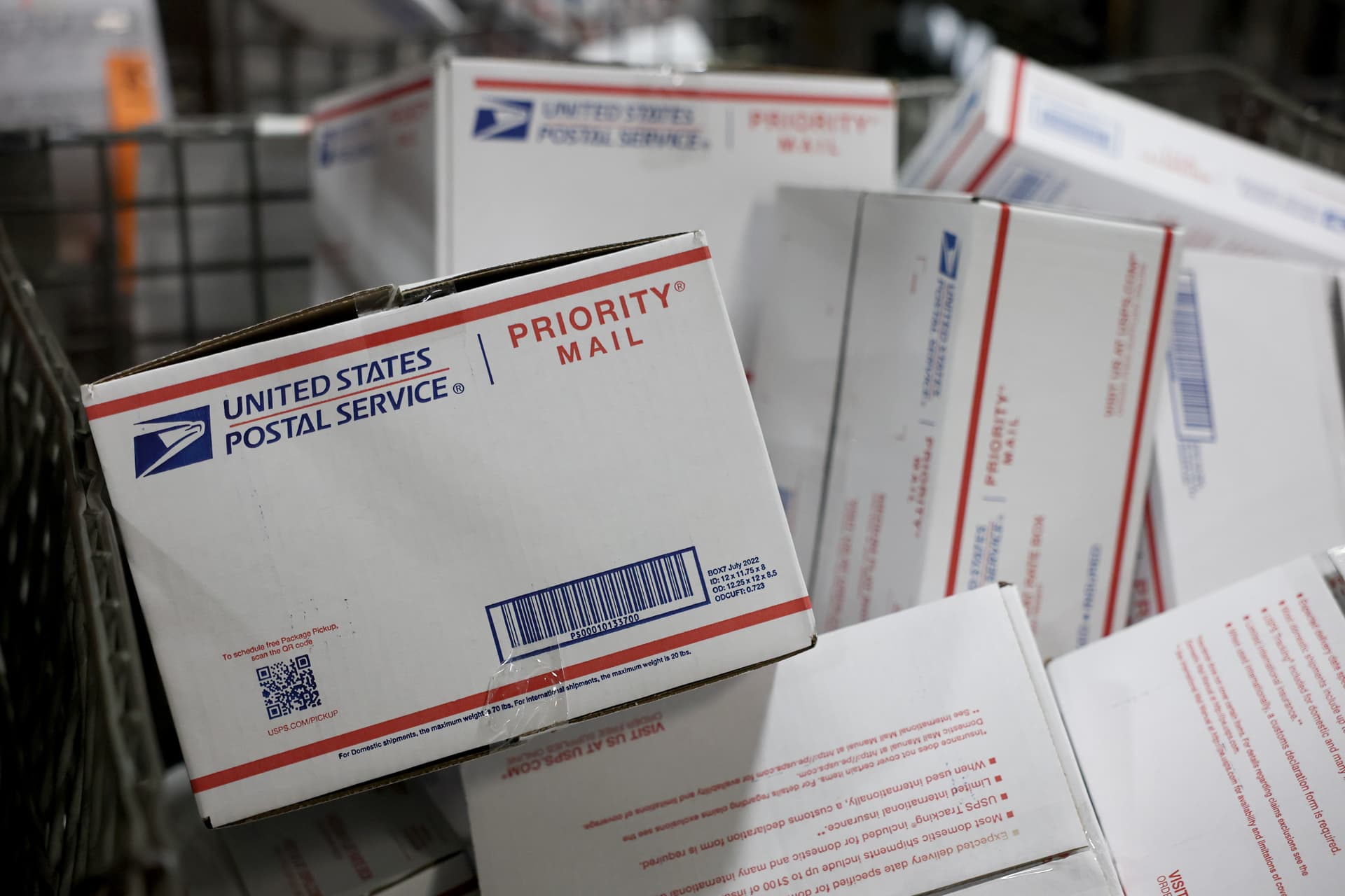 Joe Raedle/Getty Images The United States Postal Service is losing money at an alarming clip.