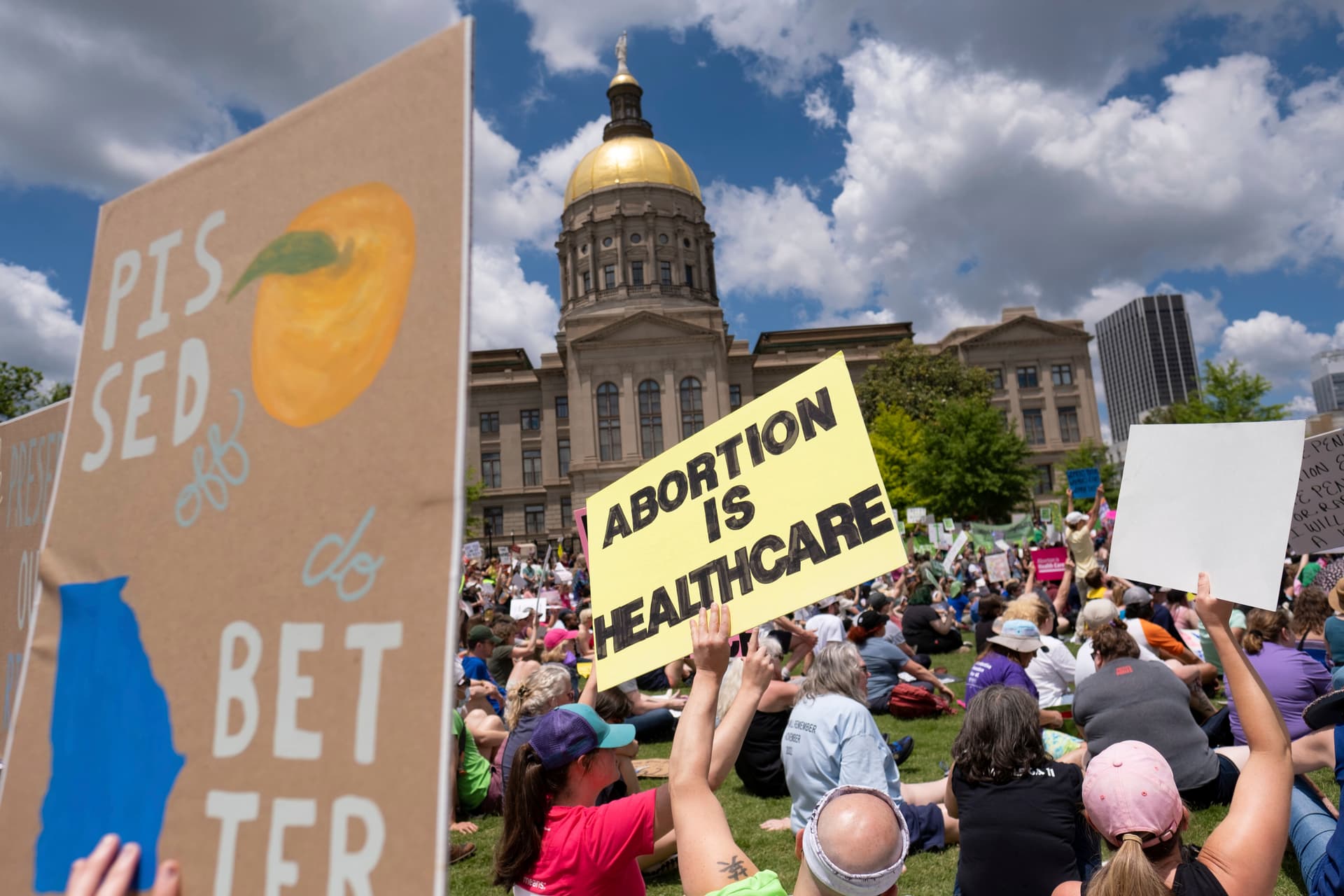 Ben Gray/Atlanta Journal-Constitution via AP Abortion rights protesters rally near the Georgia state Capitol at Atlanta.