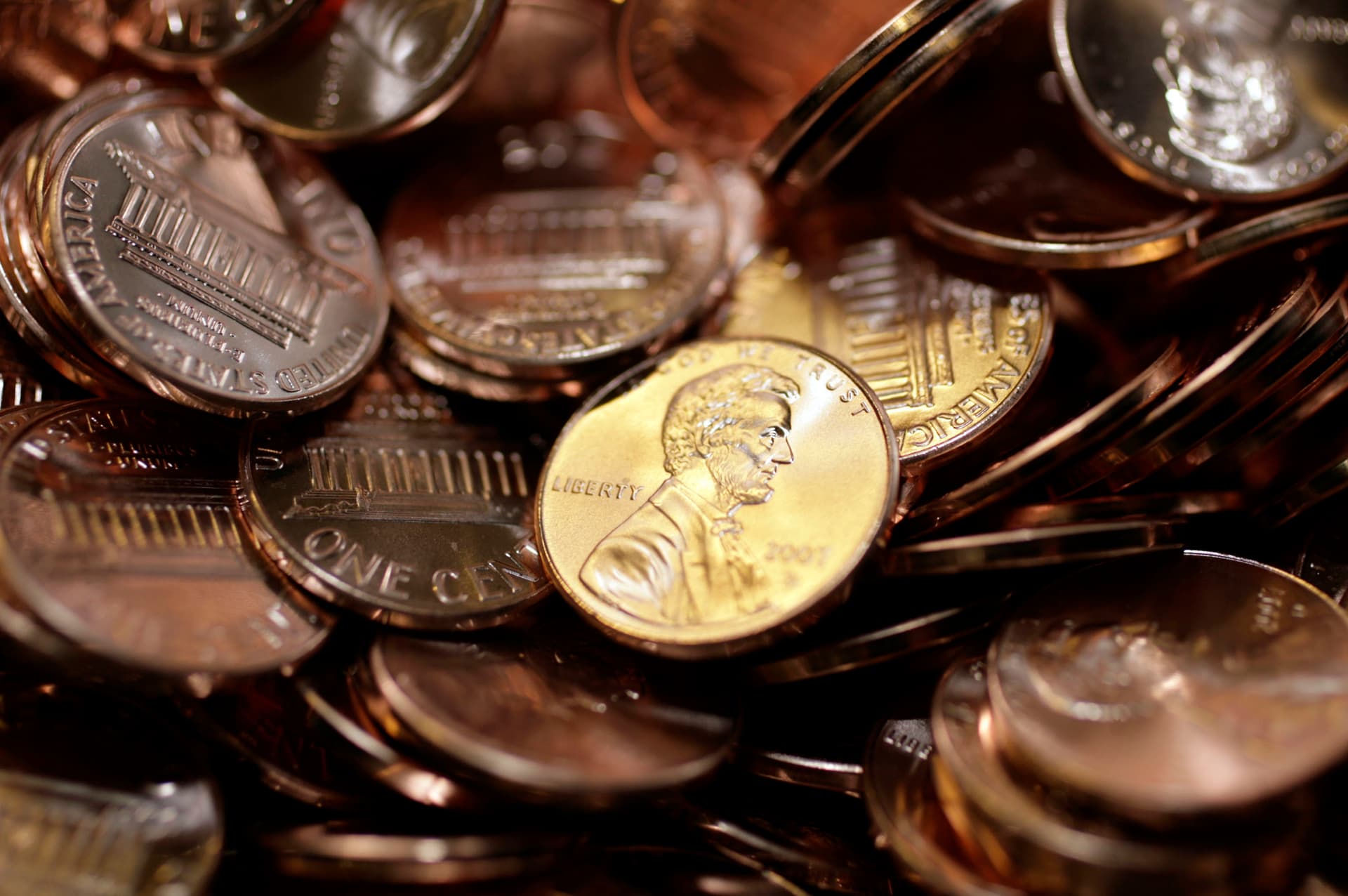 AP/David Zalubowski Freshly-made pennies sit in a bin at the United States Mint at Denver.