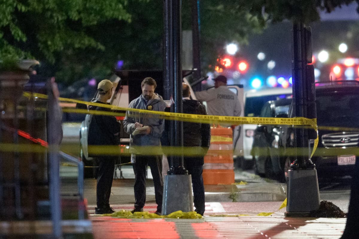 AP/Rod Lamkey, Jr. Law enforcement work the scene after two staff members of the Israeli Embassy in Washington were shot and killed outside the Capital Jewish Museum, May 22, 2025.