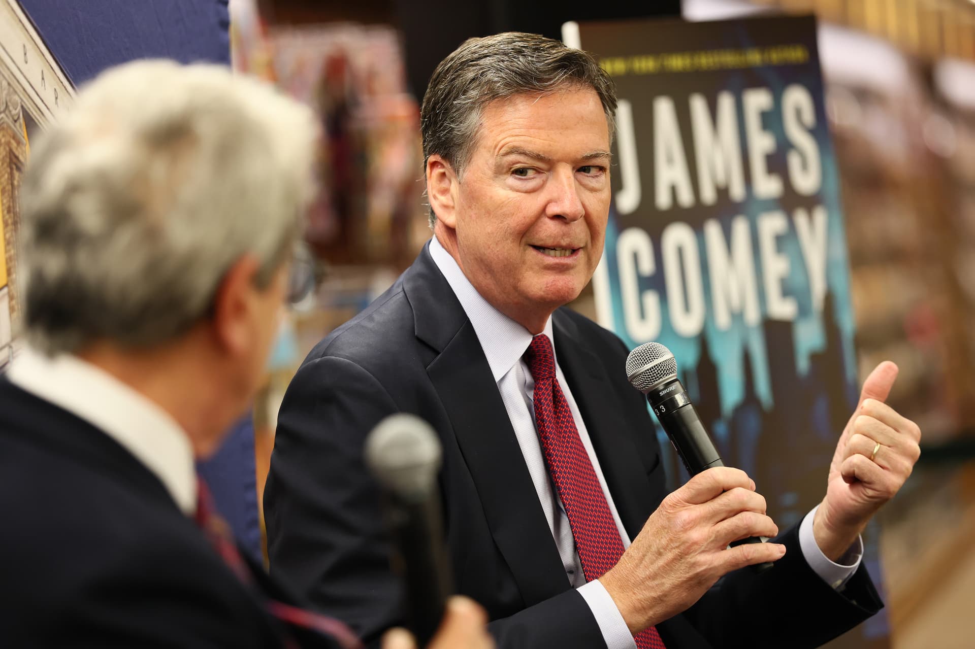 Michael M. Santiago/Getty Images The former FBI director, James Comey, speaks at a book launch at New York City on May 19, 2025.
