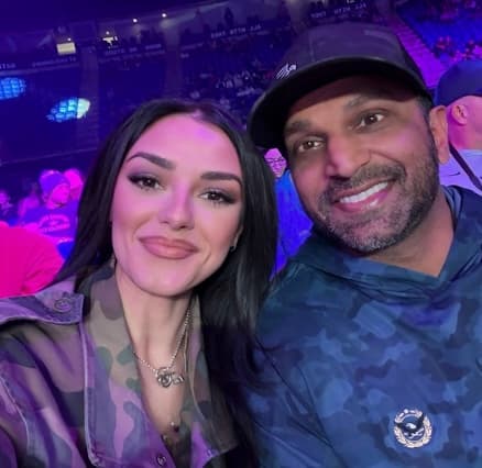Instagram Kash Patel and his girlfriend Alexis Wilkins at a wrestling match where she performed the National Anthem.