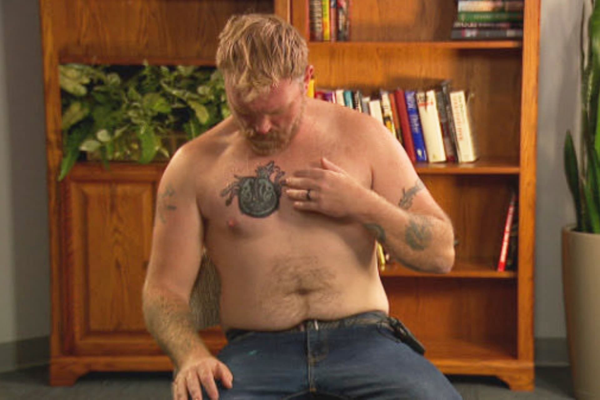 WGME via AP Candidate Graham Platner points to a covered up tattoo that had been recognized as a Nazi symbol during an interview iat Portland, Maine, on October 22, 2025.
