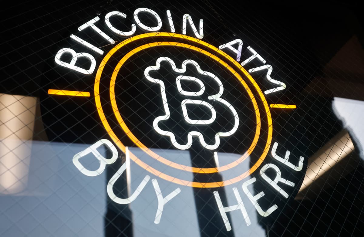 Mario Tama/Getty Images A sign advertises a Bitcoin ATM at a gas station near Pasadena, California, on July 16, 2025.