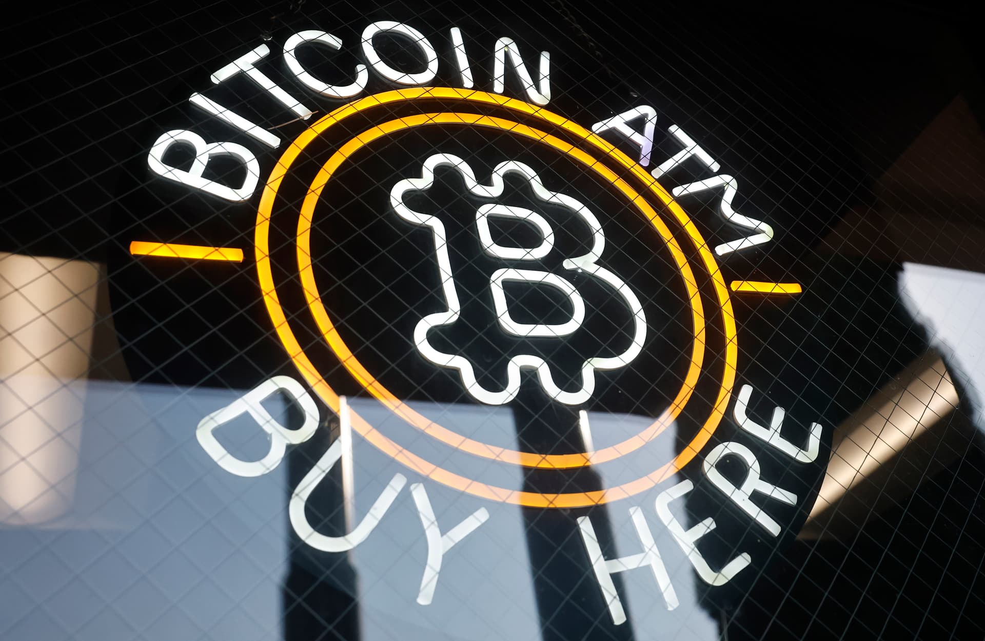 Mario Tama/Getty Images A sign advertises a Bitcoin ATM at a gas station near Pasadena, California, on July 16, 2025.