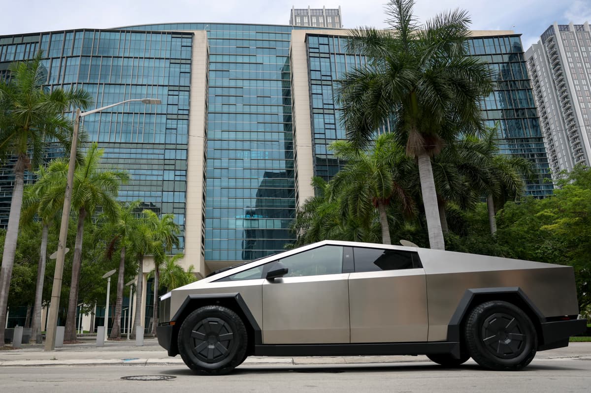 Joe Raedle/Getty Images A Tesla Cybertruck passes a federal courthouse at Miami on July 14, 2025, as jury selection begins in a case involving a fatal crash of a Tesla on autopilot at Key Largo, Florida.