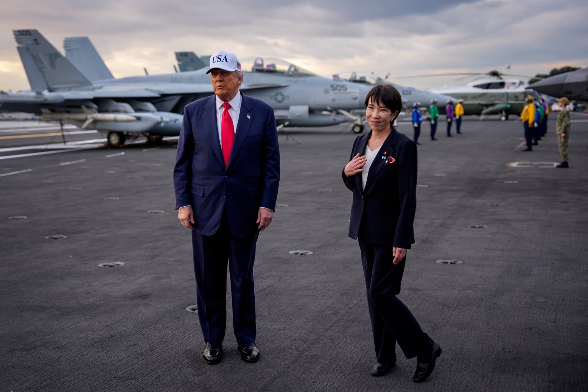 Andrew Harnik/Getty Images Japanese Prime Minister Sanae Takaichi of Japan joins President Trump aboard the USS George Washington at Yokosuka, Japan on October 28, 2025.