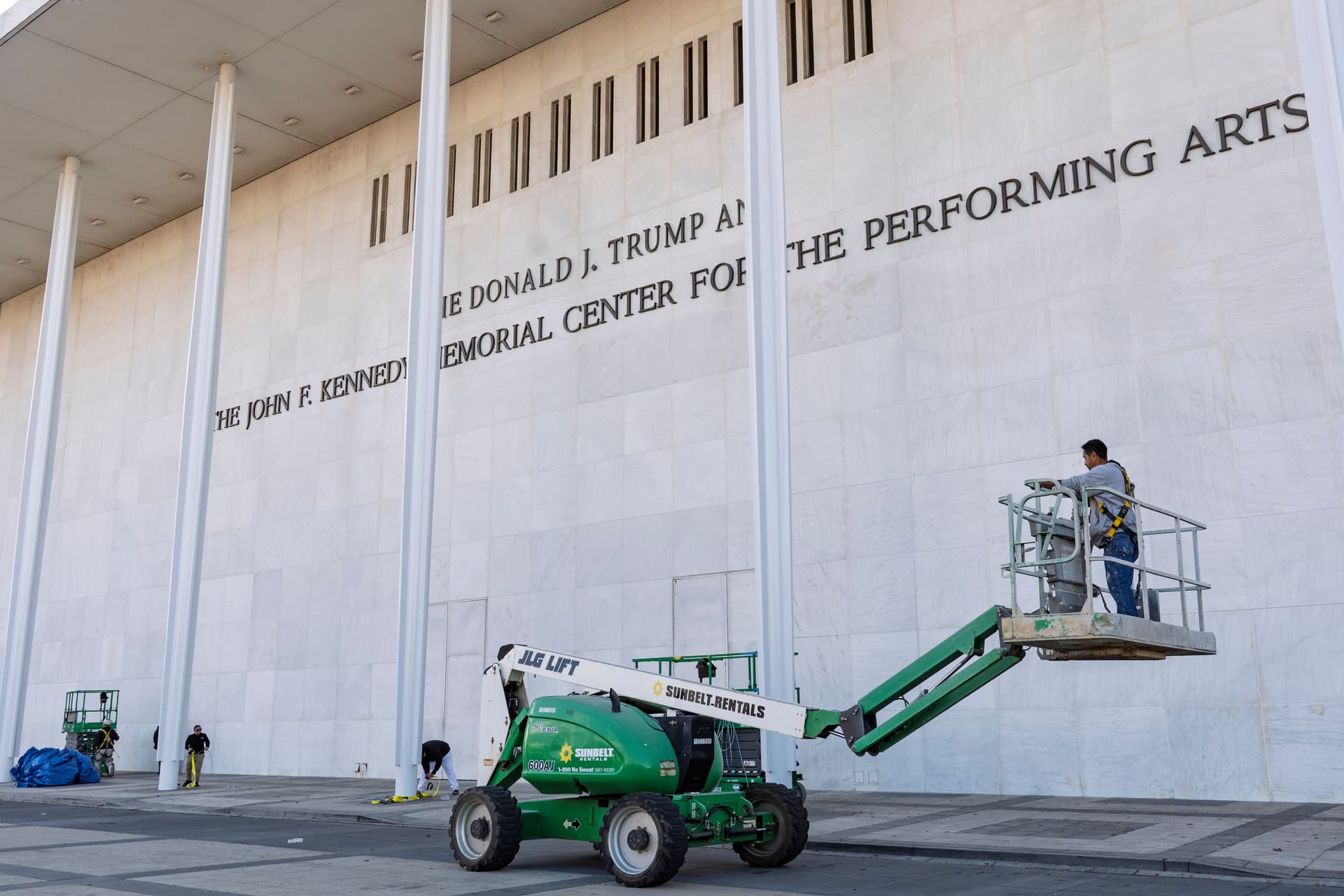 Jacquelyn Martin/AP Adding the president’s name to the façade of what a judge says can no longer be called The Donald J. Trump and The John F. Kennedy Memorial Center For The Performing Arts on December 19, 2025.