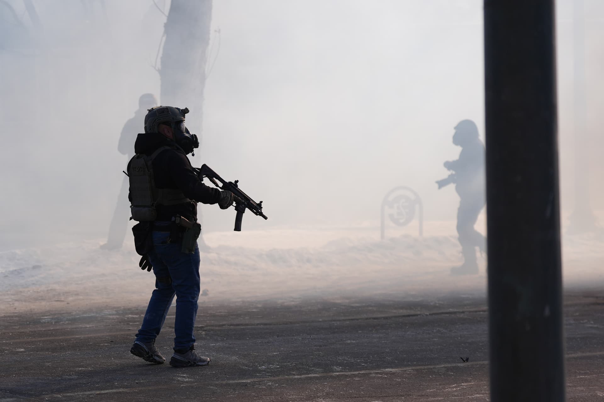 Abbie Parr/AP Federal immigration officers deploy tear gas after a shooting in Minneapolis on January 24, 2026.