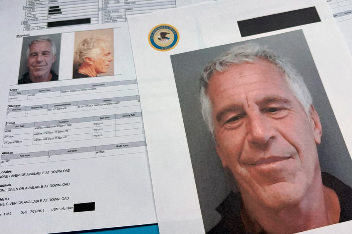 Jon Elswick/AP Documents that were included in the Department of Justice release of the Jeffrey Epstein files are photographed on January 2, 2026.
