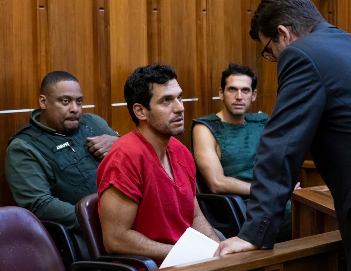 Matias J. Ocner-Pool/Getty Images Oren Alexander, center, and his twin brother, Alon, center-right, speak to their attorney Joel Denaro during their bond hearing at Miami's Richard E. Gerstein Justice Building on December 13, 2024.