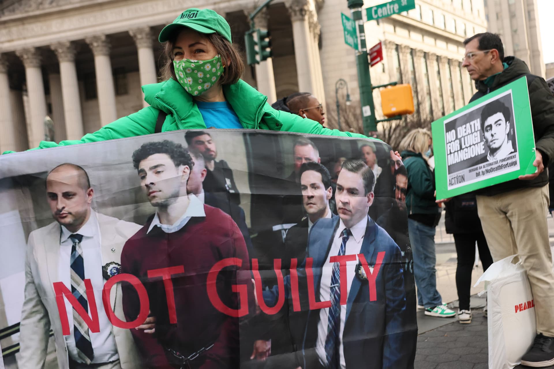 Michael M. Santiago/Getty Images Supporters of Luigi Mangione wait in line to enter Manhattan Federal Court on January 09, 2026.