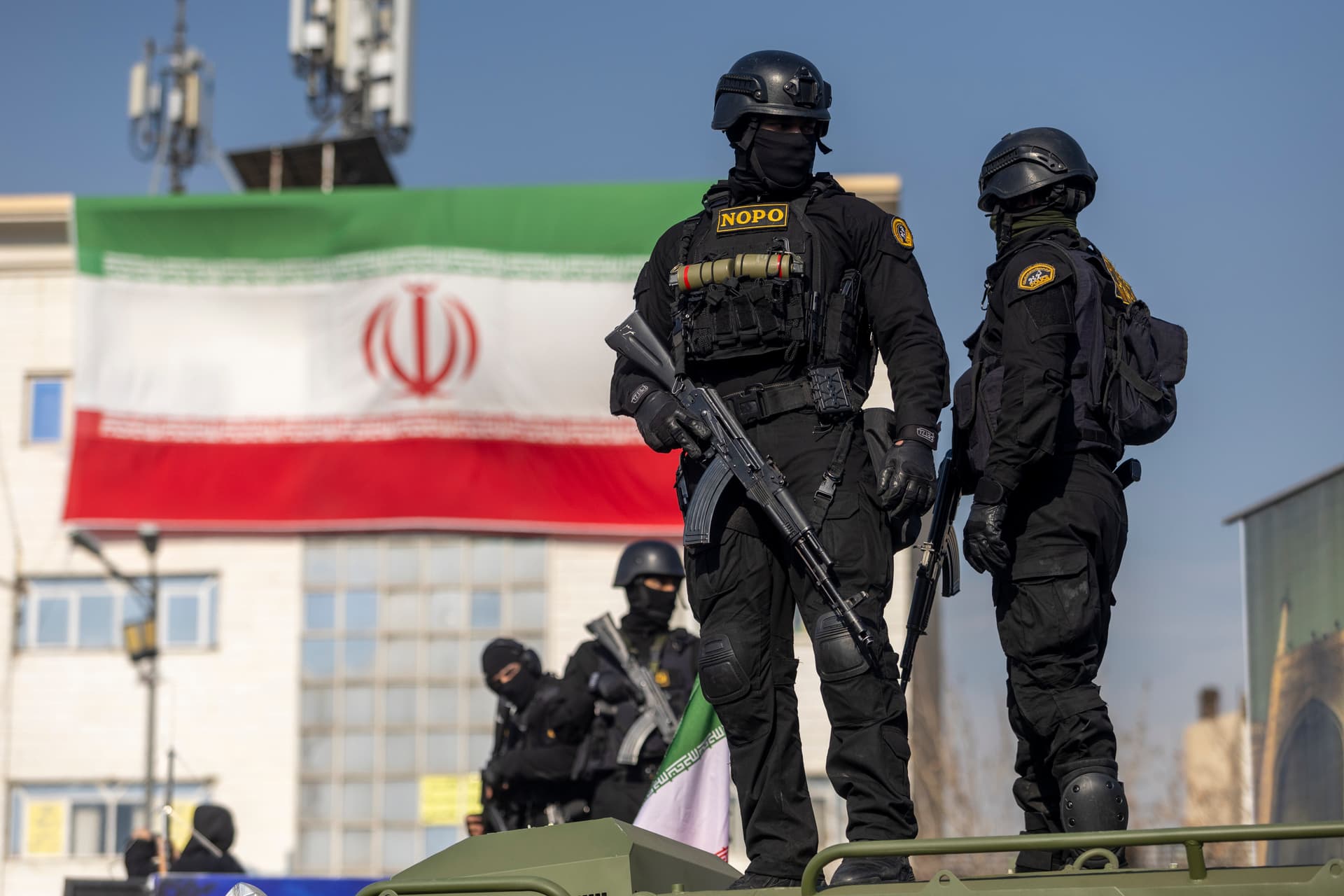 Stringer/Getty Images Security forces during a pro-government rally on January 12, 2026 at Tehran.
