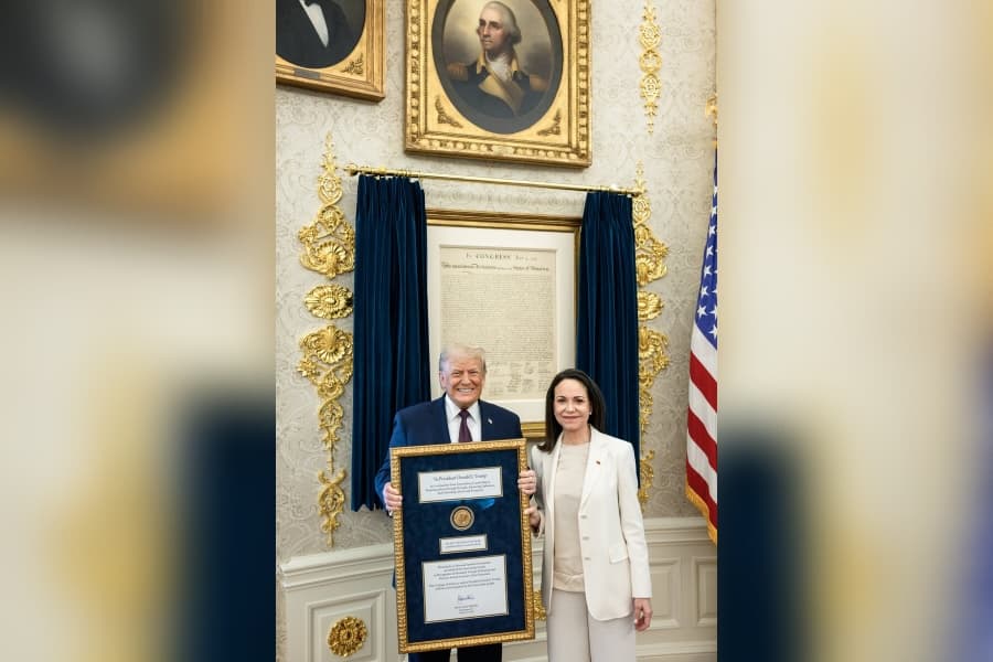 White House/X.com Trump poses with Venezuela's exiled politician María Corina Machado in the White House after she gave the president her Nobel Peace Prize medal during a visit to the White House.