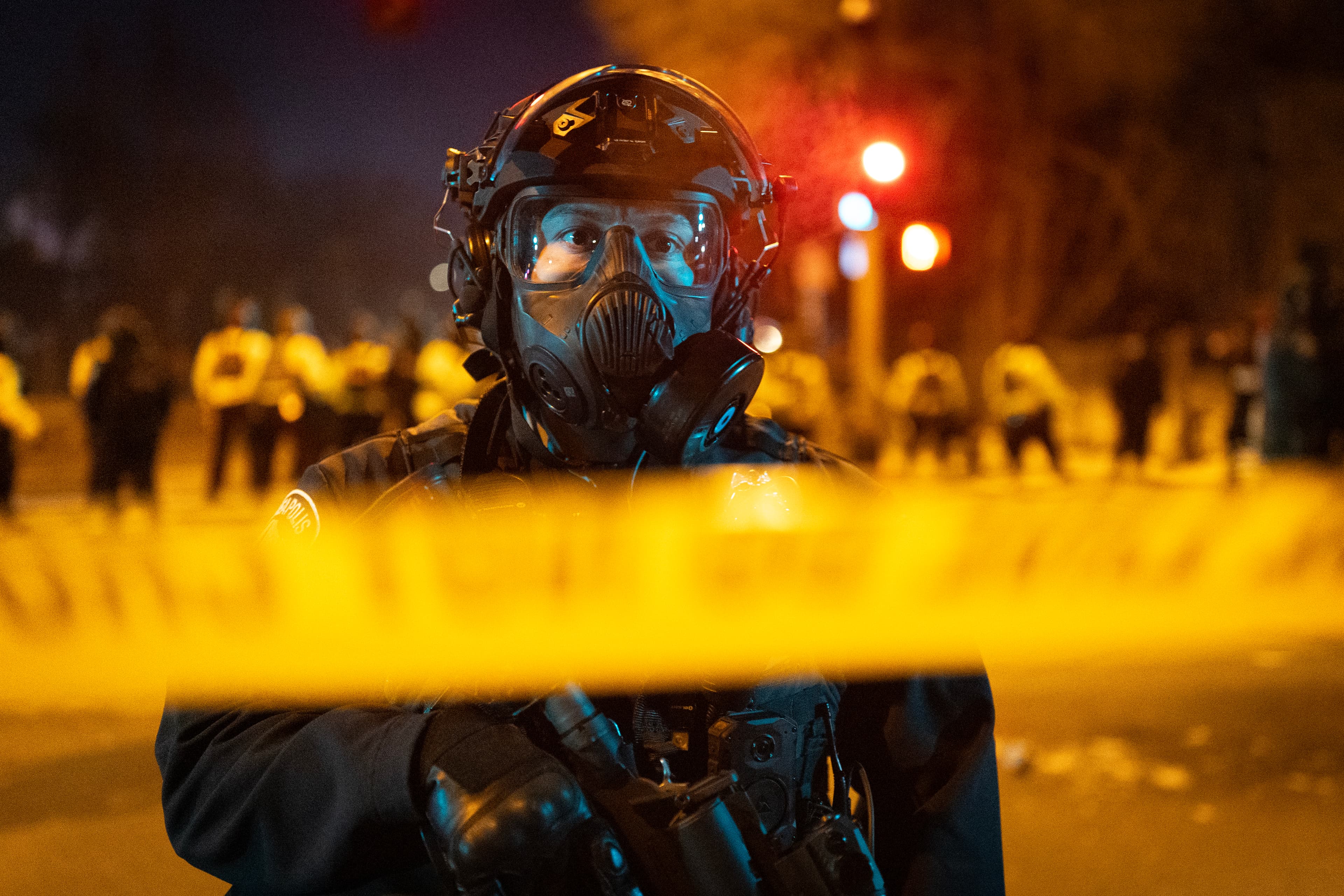 Minneapolis and Minnesota State police guard a perimeter following a shooting incident with federal agents Wednesday night. Minneapolis and Minnesota State police guard a perimeter following a shooting incident with federal agents Wednesday night.