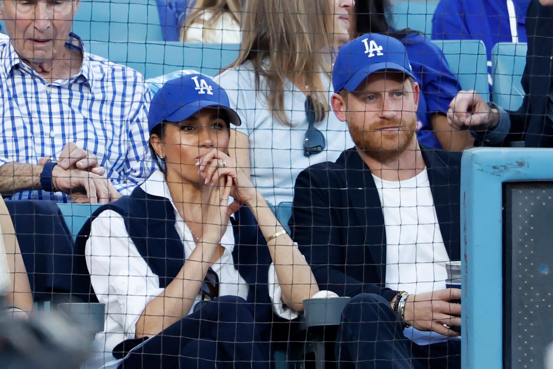 Ronald Martinez/Getty Images Prince Harry, Duke of Sussex and Meghan, Duchess of Sussex look at Dodger Stadium on October 28, 2025 at Los Angeles, California.