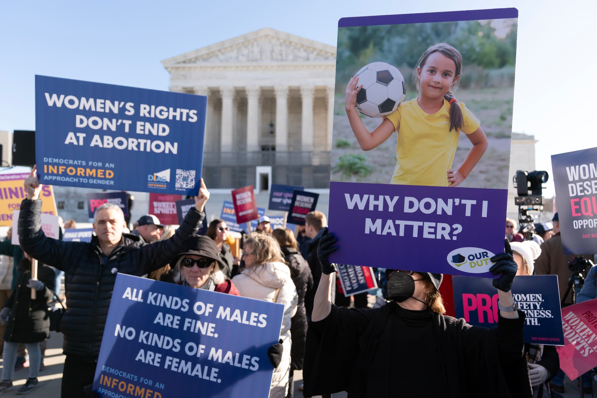 AP/Jose Luis Magana Protesters outside the Supreme Court as it hears arguments over state laws barring transgender athletes from girls' sports.